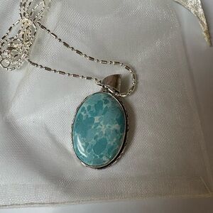 Elegant Silver and Blue Pendant Necklace